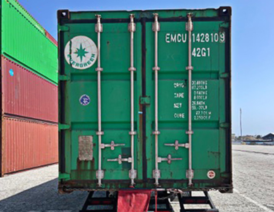 A green 40 foot standard cargo worthy shipping container